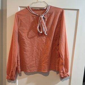 Elegant Coral Blouse with Tie Neck
